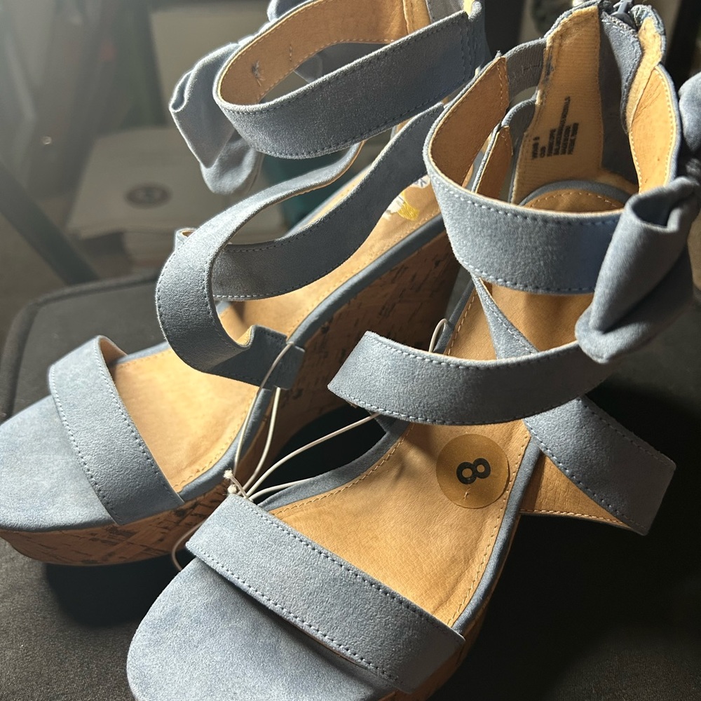 Denim wedge sandal.